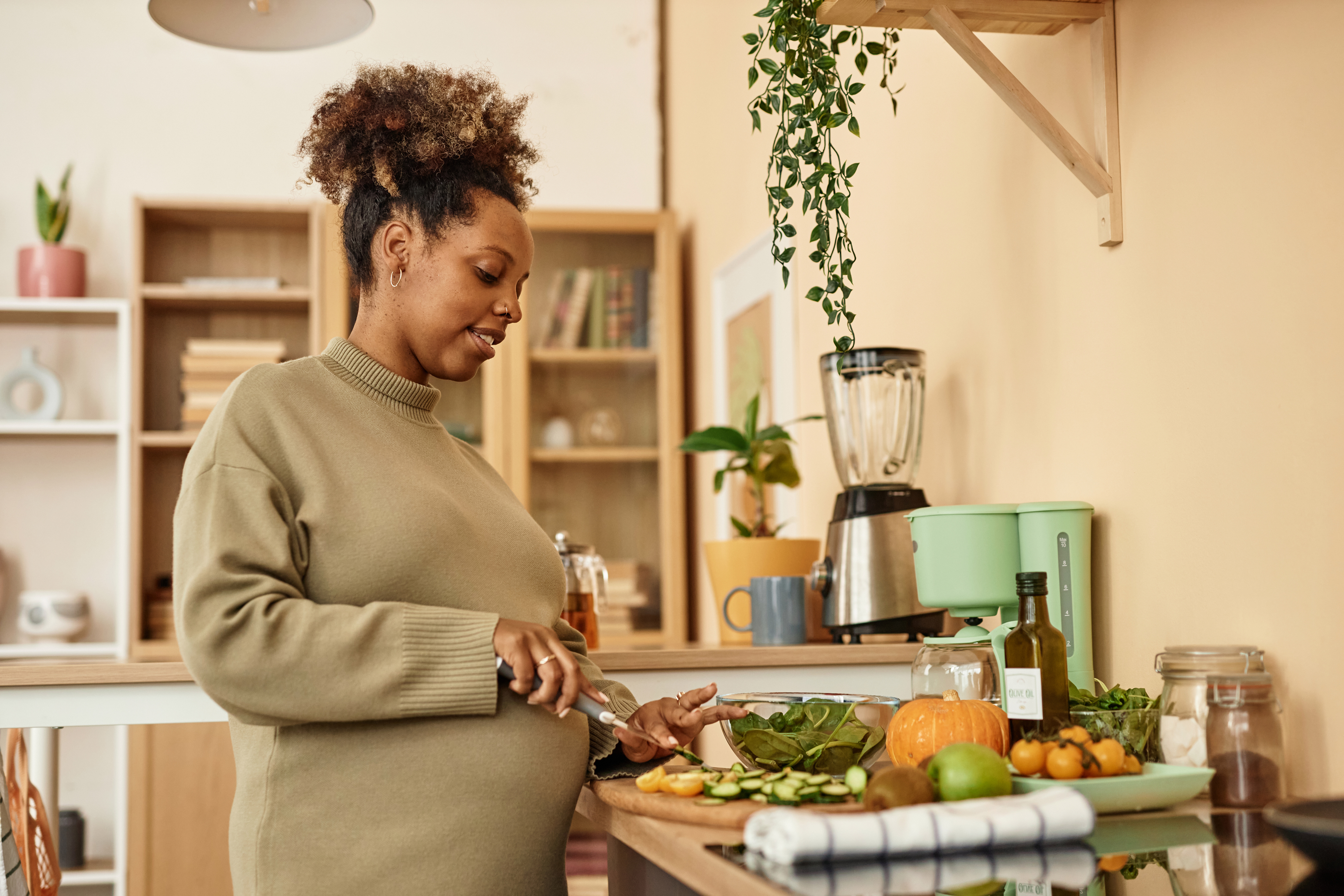 pregnant woman cooking